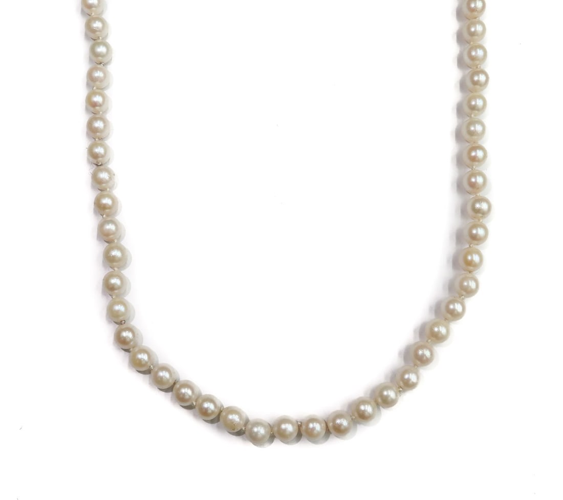 14k Yellow Gold and Cultured Pearl Single Strand Necklace: 14k Yellow Gold and Cultured Pearl Single Strand Necklace. Cultured pearls measuring approximately 6.8mm. Marked 14k to fishhook clasp. Weight Approx., 49 grams Measuring Approx., 6.8mm / 33.5 inches 