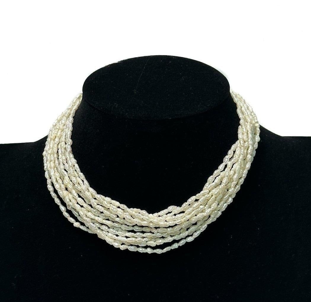 Gold Plate and Pearl 6 Strand Natural Freshwater Pearl Necklace: Gold Plate and Natural Freshwater Pearl 6 Strand Necklace. The pearls measuring around 2.6mm x 3.6mm. Gold plate clasp. Weight Approx., 30.74 grams Measures Approx., 24 inches length Domestic Shipping