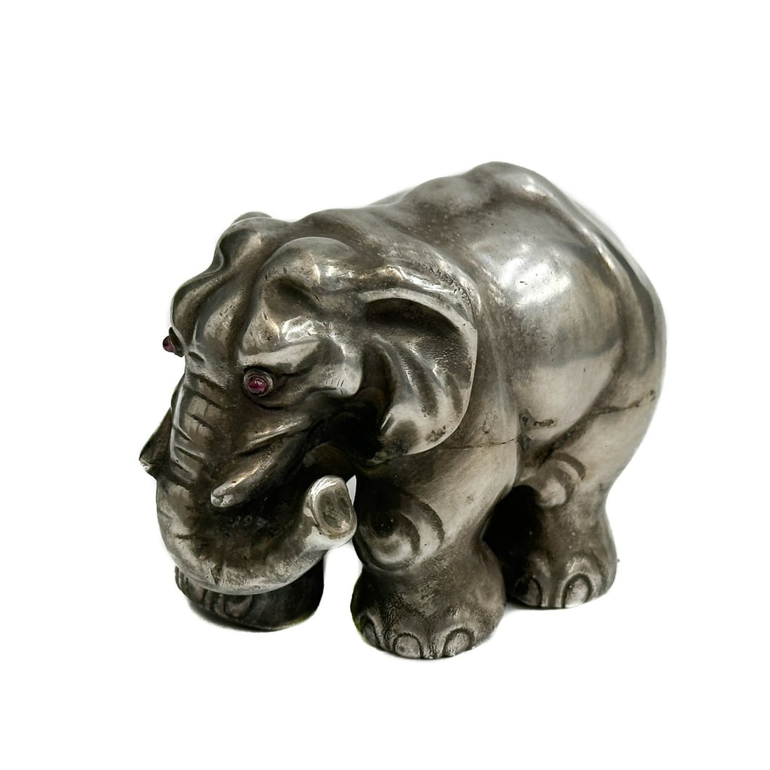 Silver Elephant Figurine Marked Russian Julius Rappoport Red Eyes 20th century: Possibly Russian Silver Elephant with Red Eyes, 20th century. Underside with Russian hallmarks, marked for Julius Rappoport (Yuly) Weight: Approx. 4.6 ozt Measurements: Approx. 3.25 inches x 2 inches 