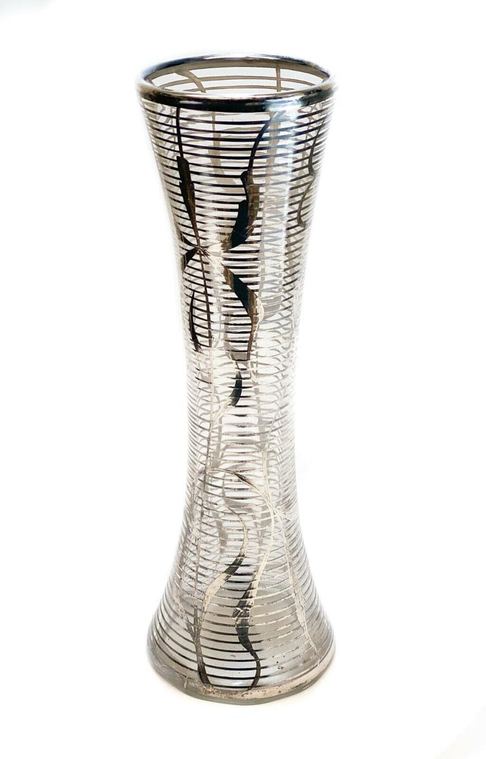 American Silver Overlay Glass Tall Vase, circa 1930. Leaf & Stripe Designs: American silver overlay glass tall vase, circa 1930. Leaf and striped designs throughout. Unmarked. Weight: Approx. 1 lb Measurements: Approx. 4.5 inches diameter x 12.5 inches tall Condition: Very go