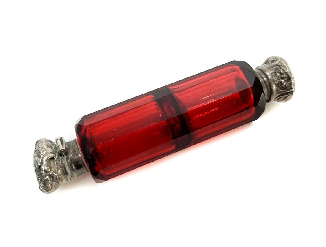 Continental Cranberry Red Glass and Silver Dual Compartment Vanity Bottle c1900: Continental cranberry red glass and silver dual compartment vanity bottle, circa 1900. Hand chased scrolls to the stoppers. Apparently unmarked, but tests for silver. Weight: Approx. 0.2 lb Measuremen
