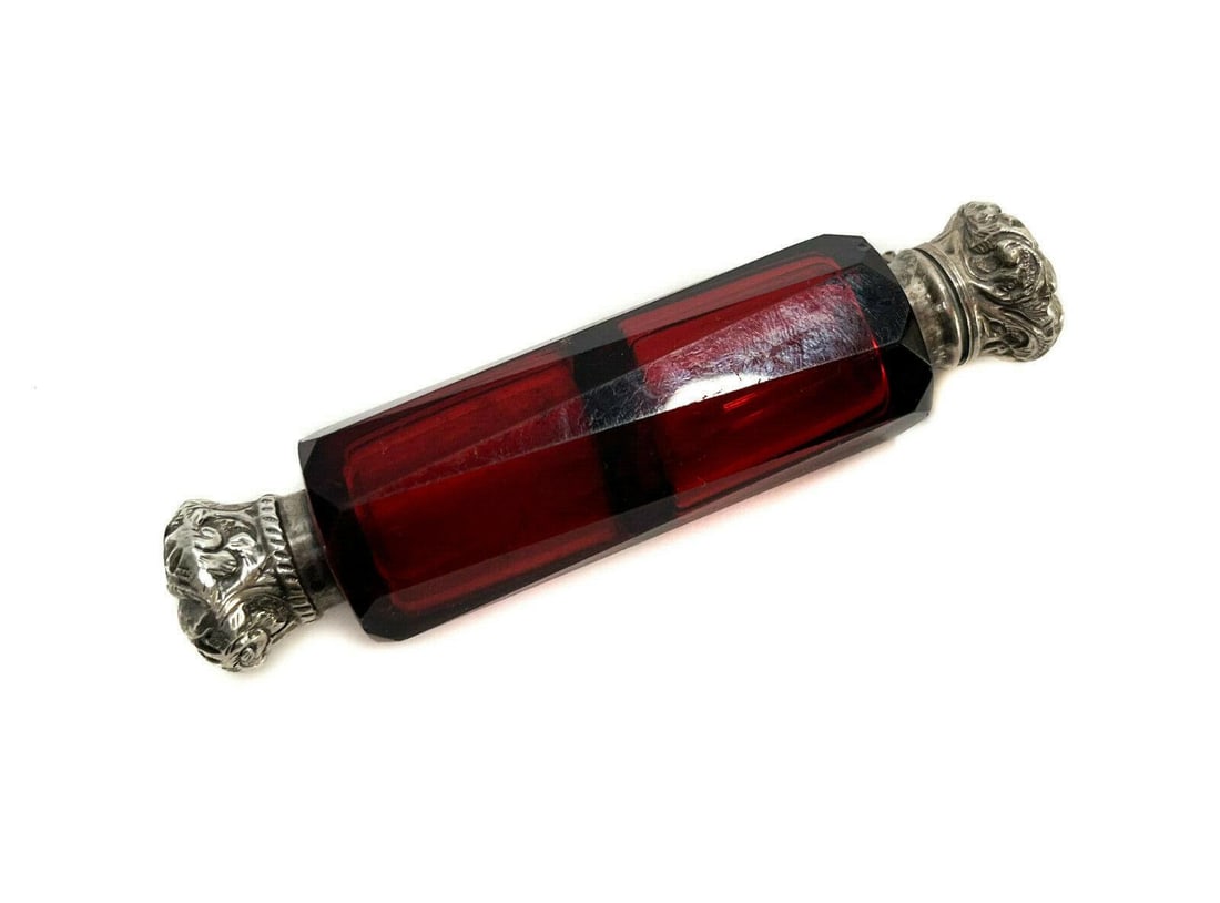 Continental Cranberry Red Glass and Silver Dual Compartment Vanity Bottle c1900: Continental cranberry red glass and silver dual compartment vanity bottle, circa 1900. Hand chased scrolls to the stoppers. Apparently unmarked, but tests for silver. Weight: Approx. 0.2 lb Measuremen