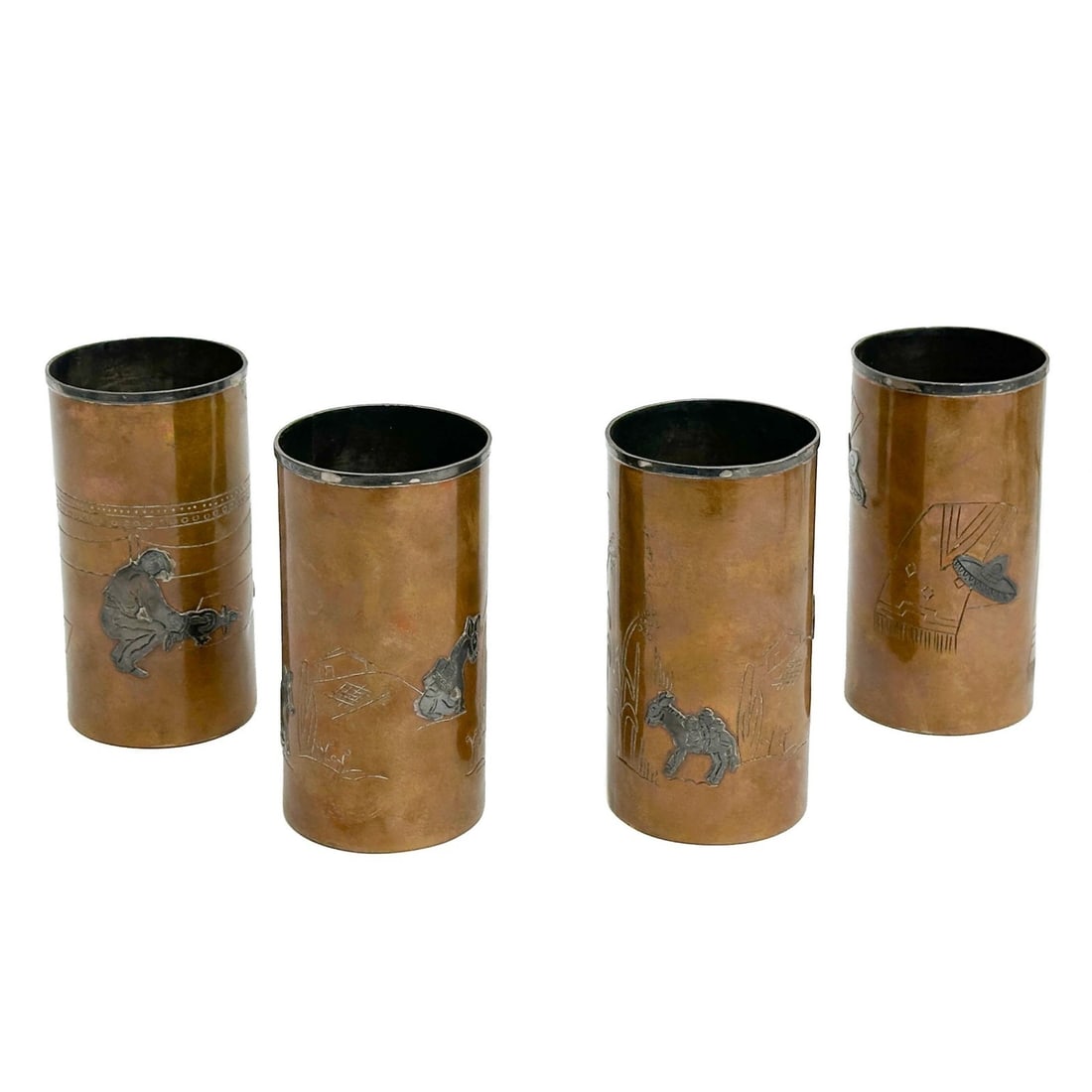 4 Victoria Taxco Mexico Applied Silver Copper Tumblers mid century 267 266: 4 Victoria Taxco Mexico Applied Silver Copper Tumblers, mid century. Copper body with applied silver desert scenes with figures to the sides. Underside marked Victoria Taxco Mexico 267, one marked 266