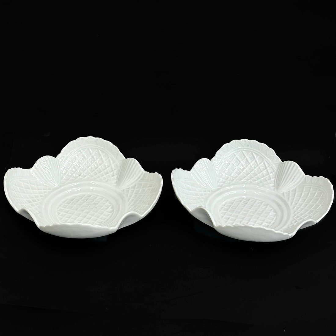 Pair Meissen Germany Molded Porcelain Dishes circa 1900: Pair Meissen Germany Molded Porcelain Dishes, circa 1900. Underside with Meissen crossed swords marks Weight: Approx. 3 lbs Measurements: approx. 8.375 inches x 8.375 inches Condition: one with a chip