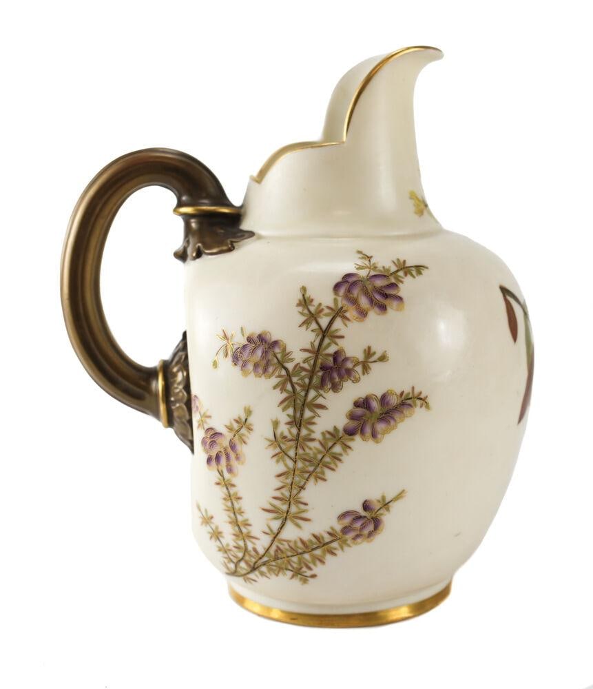 Royal Worcester English Porcelain Hand Painted Pitcher, 19th Century: A charming Royal Worcester English porcelain pitcher, 19th Century. Hand painted flowers with gilt accents. Marked to the underside base. Weight Approx., 1 lb Measures Approx., 5.5 inches x 6.5 inches