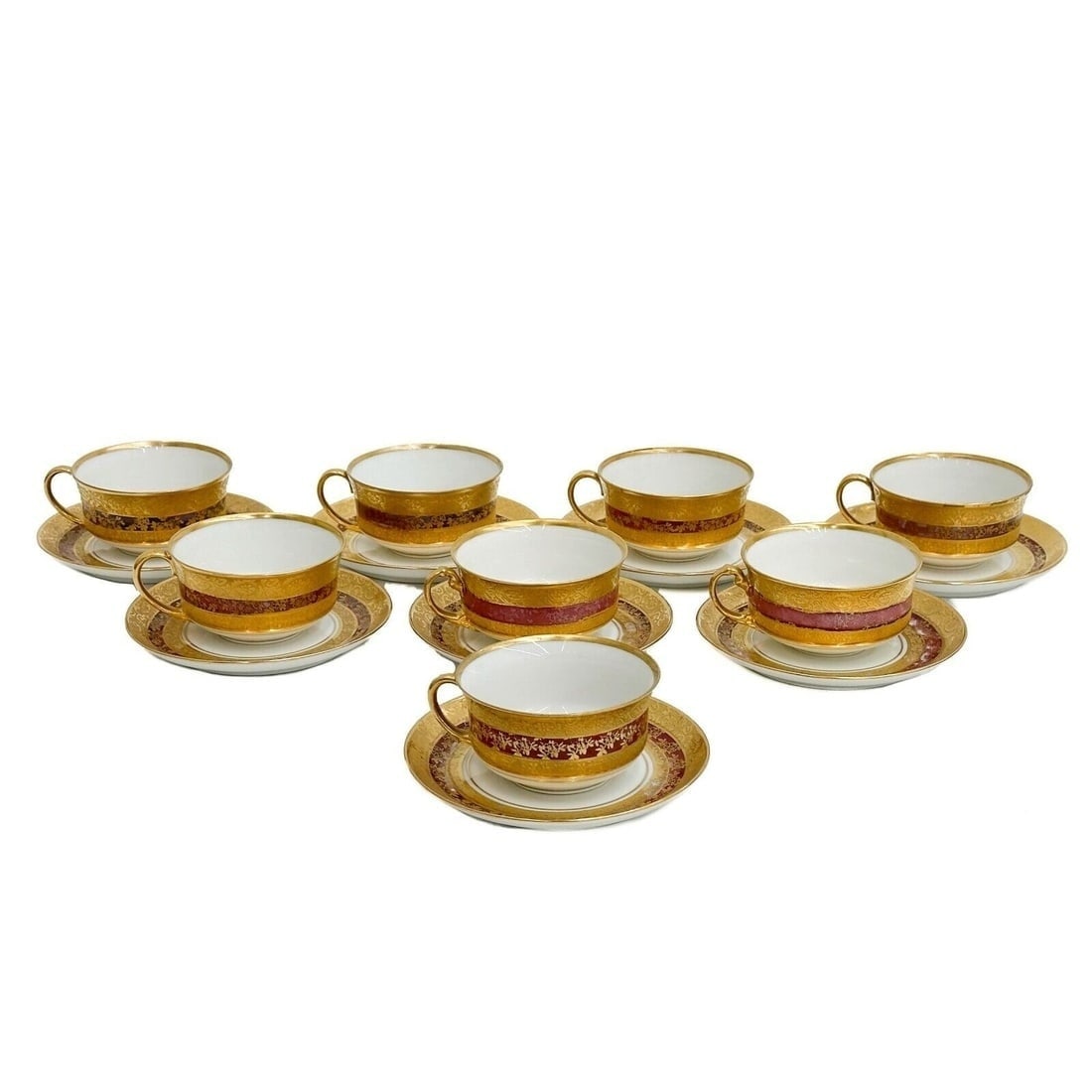 8 Hutschenreuther Selb Bavaria Gilt Porcelain Cup & Saucers Red: 8 Hutschenreuther Selb Bavaria Gilt Porcelain Cup & Saucers Red. A red band to the edge, gilt floral decoration to the edge. Underside marked Hutschenreuther Selb Bavaria. Weight: Approx. 3 lbs Measur