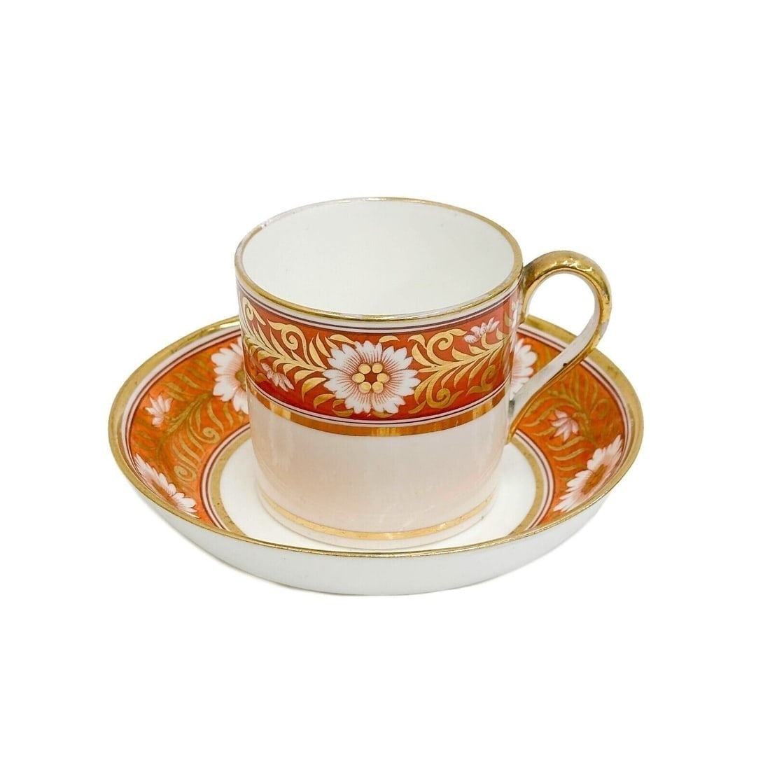 Spode England Hand Painted Cup & Saucer in Pattern 878 Gilt Orange Florals c1820: Spode England Hand Painted Cup & Saucer in Pattern 878. An orange band to the edge with florals, gilt accents. Underside with FF impressed marks Weight: Approx. .5 lb Measurements: Approx. Cup: 3.5 in