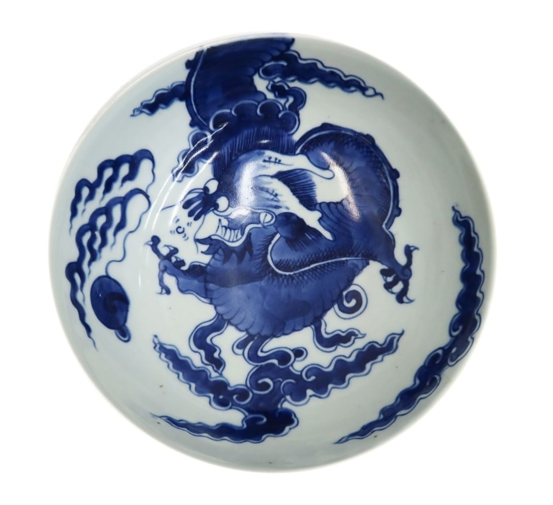 Chinese Porcelain Dragon Bowl: Chinese Porcelain Blue and White Dragon Bowl. White ground with blue figural dragon to interior and exterior of bowl. Unmarked. Weight Approx., 1.5 lbs Measures Approx., 8.75 inches diameter x 3.825 i