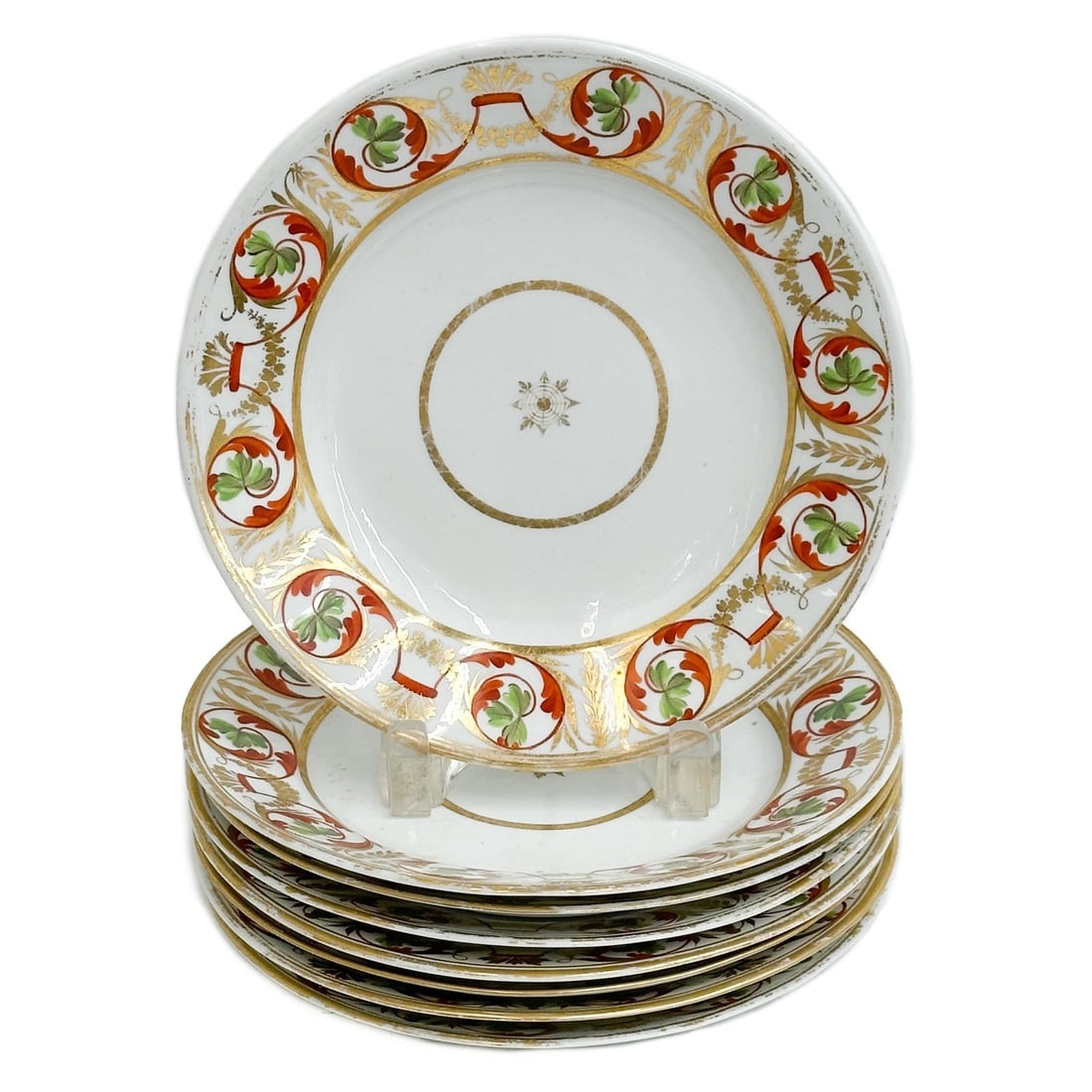 8 Royal Crown Derby Hand Painted Porcelain Dessert Plates c1810: 8 Royal Crown Derby Hand Painted Porcelain Dessert Plates, circa 1810. A white ground, decorated to the edge with red green and gilt foliate designs. Gilt decoration to the center. Underside with red 