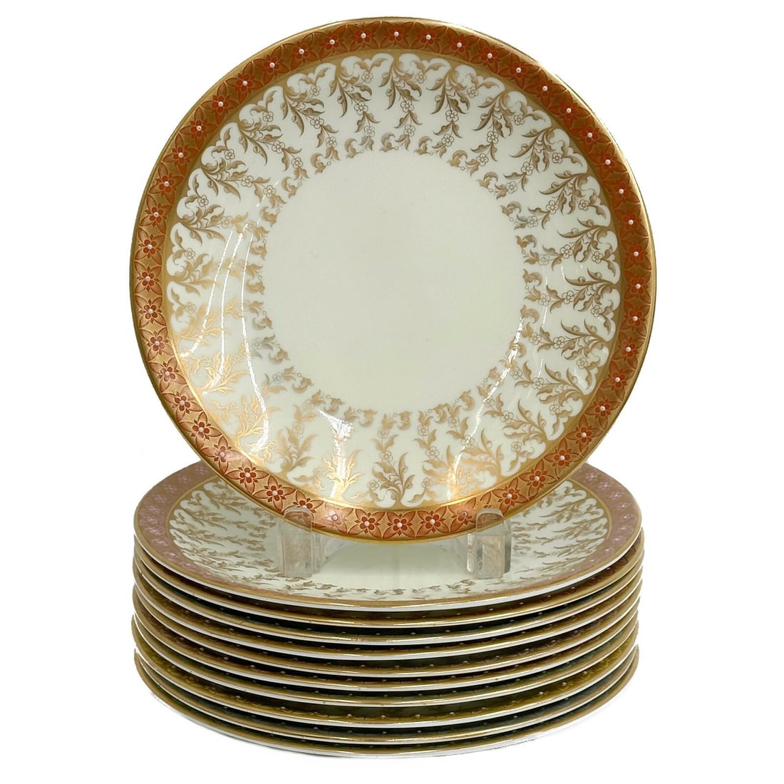 11 Royal Worcester England Porcelain Dessert Plates 1888: 11 Royal Worcester England Porcelain Dessert Plates, 1888. Various colored florals to edge with jeweled white enamel accents, gilt decoration. Underside with Royal Worcester marks Weight: Approx. 9.5 