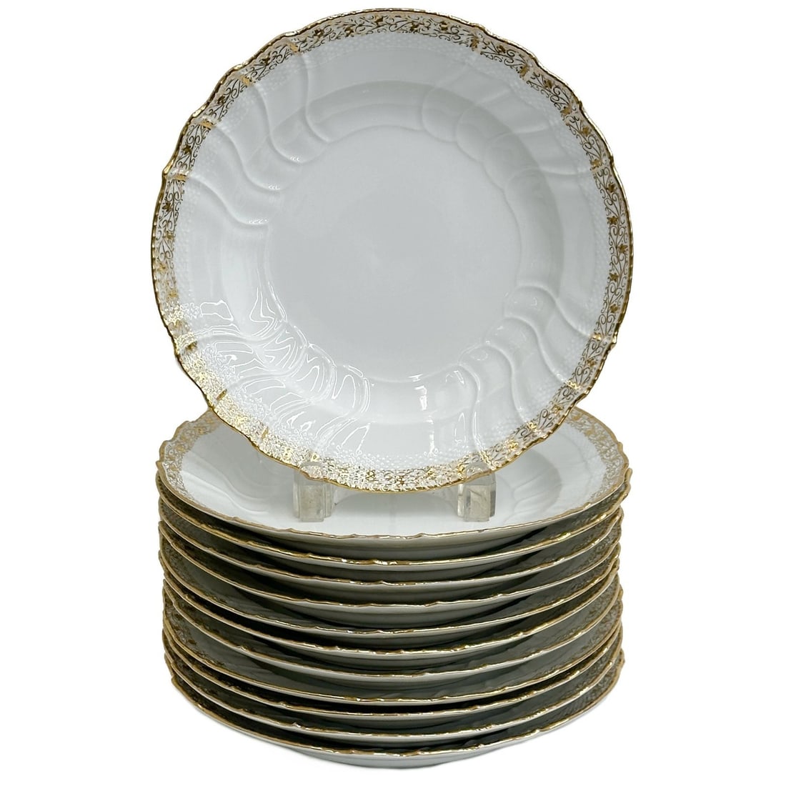 12 KPM Berlin Gilt Porcelain Basketweave Deep Well 9.25in Dinner Plates: 12 KPM Berlin Gilt Porcelain Deep Well Dinner Plates. Basketweave edge, ornate gilt decoration to the rim. Underside with KPM scepter marks. Weight: Approx. 13.5 lb Measurements: approx. 9.25 inches d