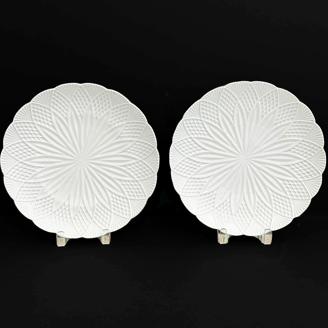 Pair Meissen Germany Molded Floral Porcelain 11.5 in Serving Dishes c1900: Pair Meissen Germany Molded Porcelain Dishes, circa 1900. Molded floral design. Underside with Meissen crossed swords mark Weight: Approx. 3 lbs Measurements: approx. 11.5 inches diameter Condition: V