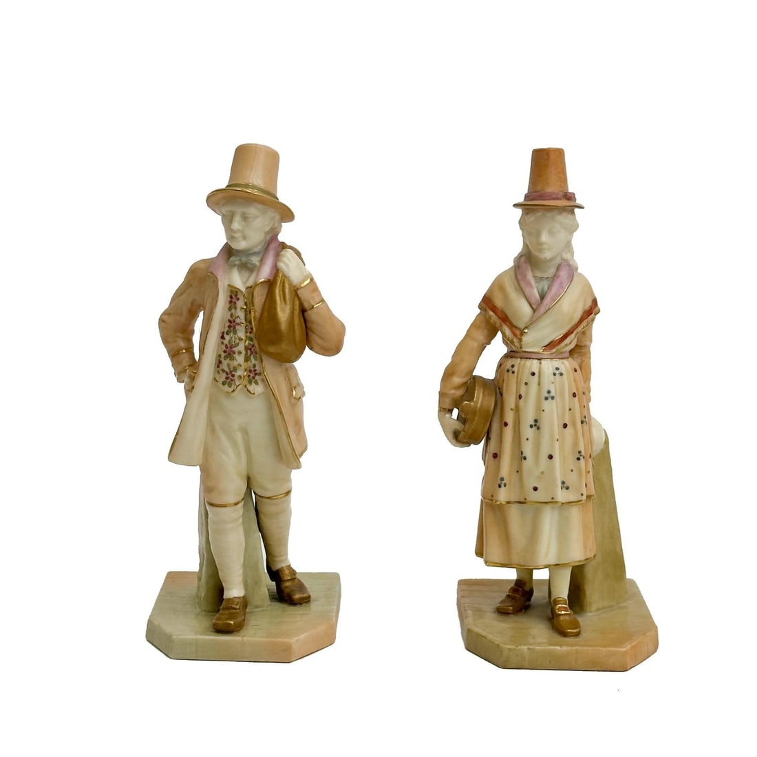 Pair Royal Worcester Porcelain Blush Ivory Figurines Man and Woman c1910: Pair Royal Worcester Porcelain Blush Ivory Figurines. Depicts a man and a woman each in top hats. Royal Worcester marks to the underside for circa 1905 and 1912. Weight: Approx. 1 lb Measurements: App