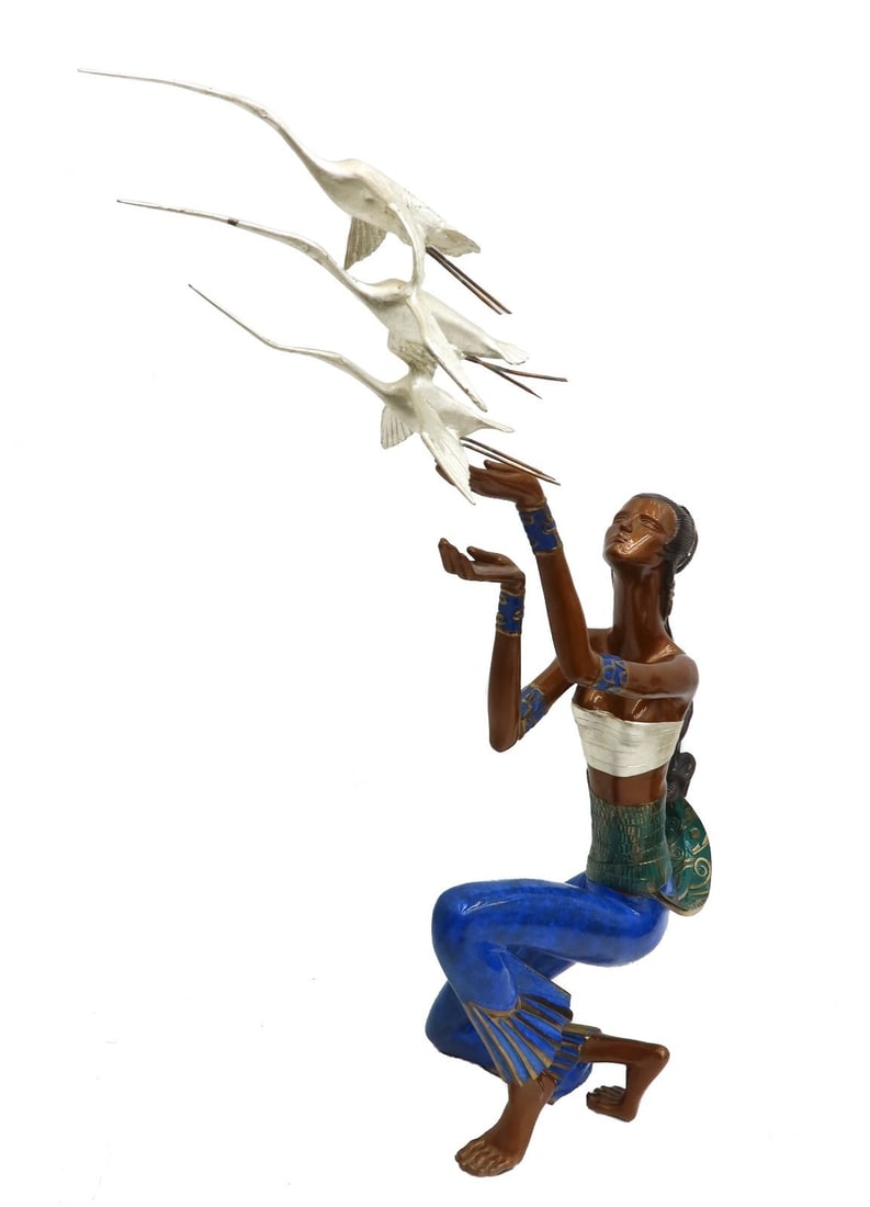 Ting Shao Kuang (Chinese 1939) Cold Painted Bronze Flight Limited Edition of 199: Ting Shao Kuang (Chinese 1939) Cold Painted Bronze, Flight. The sculpture depicts a woman kneeling with birds flying from the palm of her hand. Signed Ting Shao Kuang and limited edition 79/199. With 