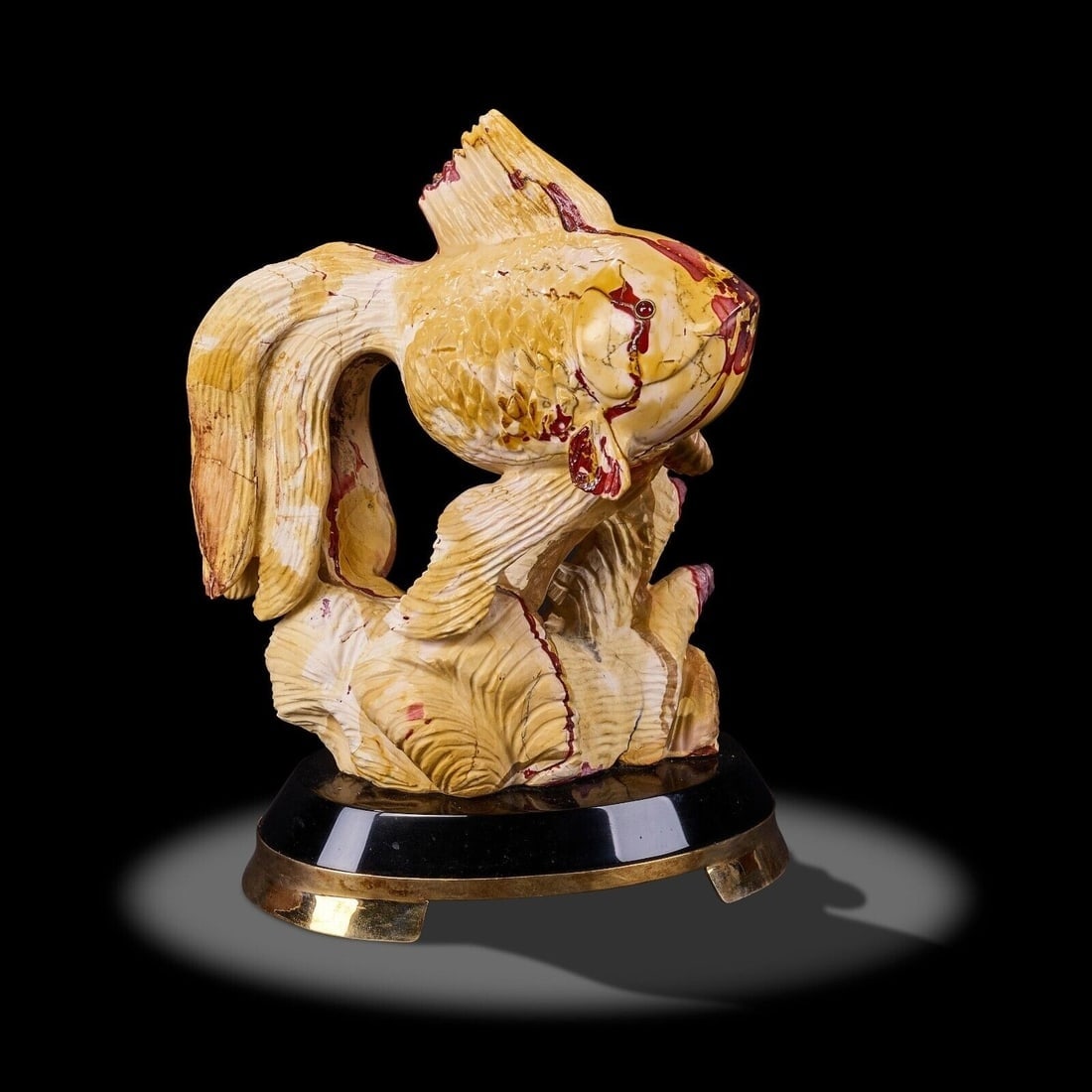Luis Alberto Quispe Aparicio Carved Mookite Koi Fish Large Sculpture: Luis Alberto Quispe Aparicio Carved Mookite Koi Fish Sculpture. Carved from a single specimen of Australia jasper known as mookite, gold rimmed garnet eyes. Gilt silver and onyx base. Weight: Approx. 