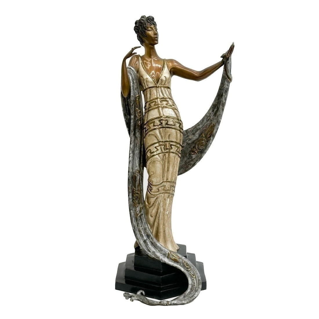 Erte Romain De Tirtoff Bronze Sculpture Coquette Ltd Ed/375 Signed: Erté (Romain De Tirtoff) (Russian/French 1892-1990) Painated and Gilt Bronze Sculpture, Coquette. Depicts a woman wearing a long shawl and holding a compact, gilt accents. Hexagonal shaped base, sign