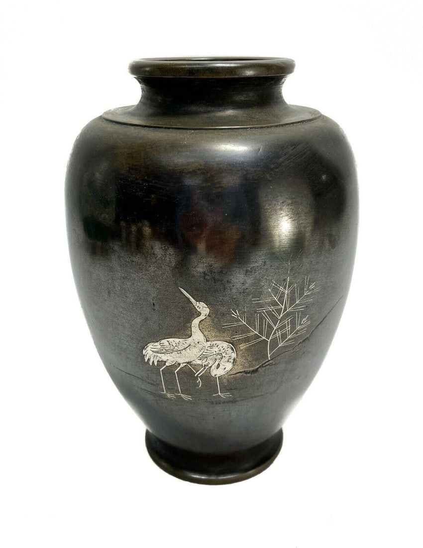 Japanese Mixed Metal Bronze and Silver Vase, Storks, Likely Meiji Period: Japanese mixed metal bronze and silver Vase. The central area depicts silver inlaid storks next to a leafless tree. With extensive Japanese maker hallmarks to the underside base. Likely from Japan's M