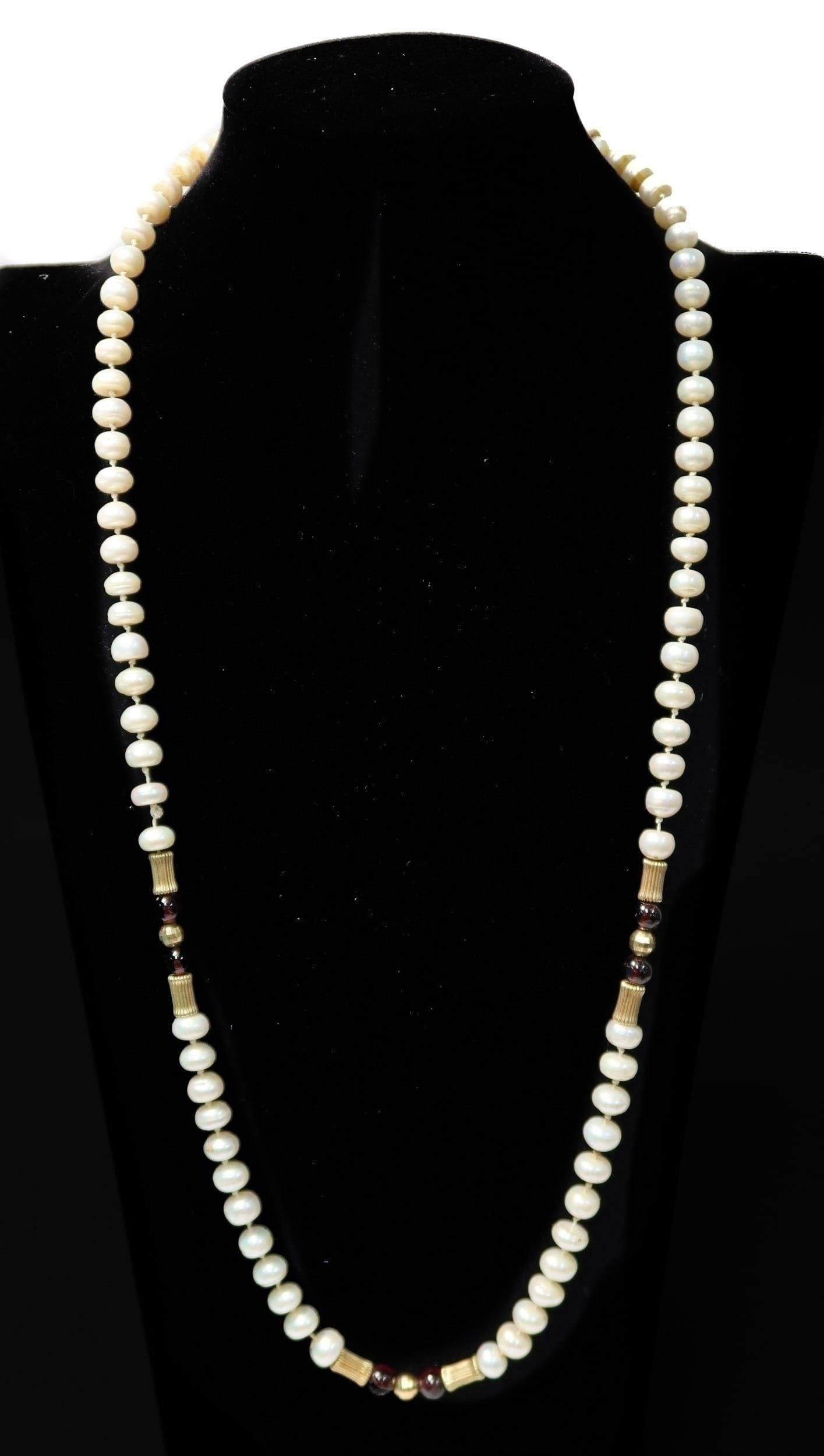 14k Yellow Gold Pearl Garnet and Yellow Gold Single Strand Necklace: 14k Yellow Gold Pearl Garnet and Yellow Gold Single Strand Necklace. Marked "14k" to the clasp. Weight Approx., 40 grams Measures Approx, 26 inches length Domestic Shipping: $25