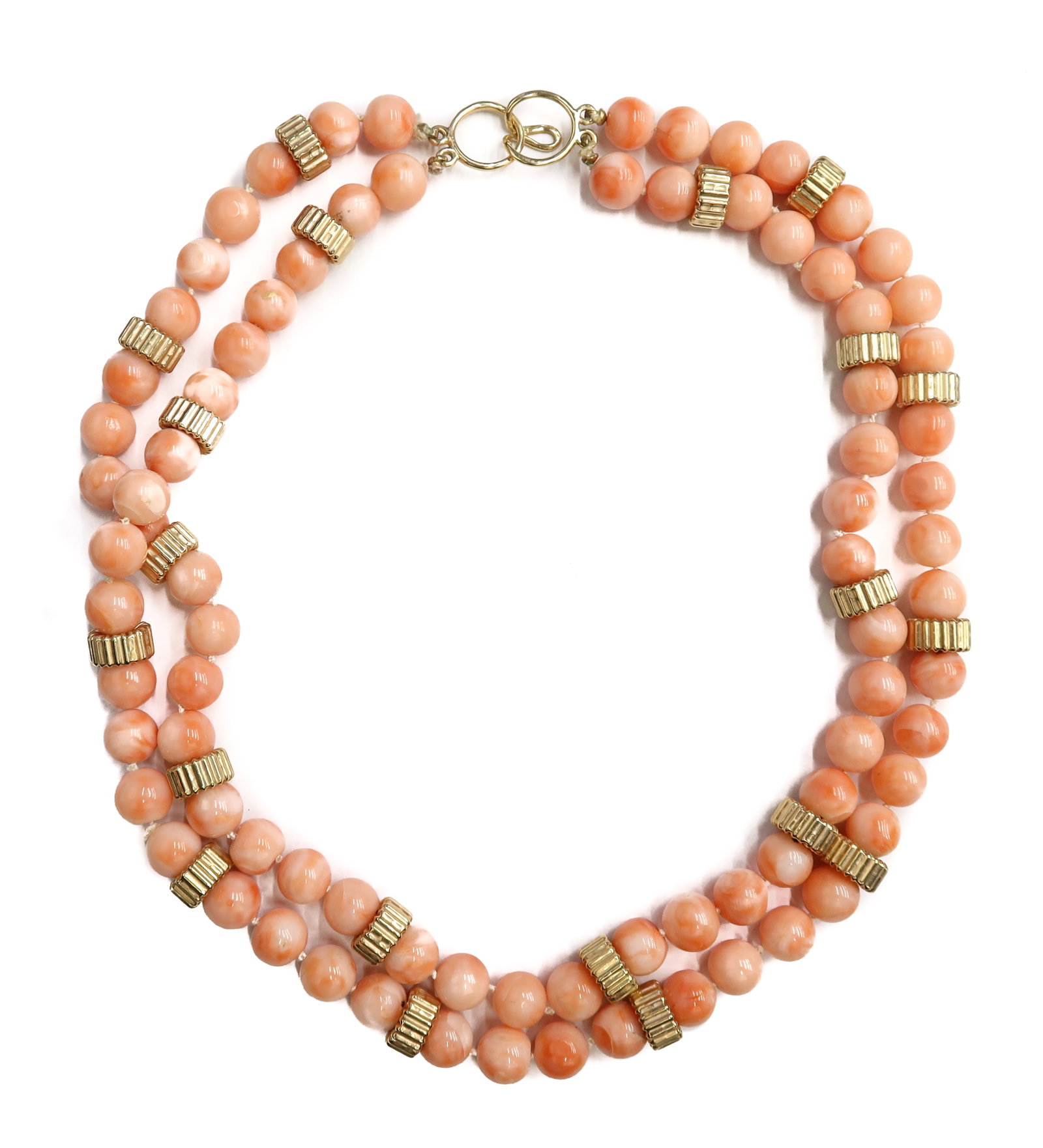 14k Yellow Gold and Coral Double Beaded Necklace: 14k Yellow Gold and Coral Double Beaded Necklace. Coral beads measuring approximately 8.76mm. 20 ribbed gold spacer discs throughout. Marked 14k to hook. Weight Approx., 92.35 grams Measures Approx., 