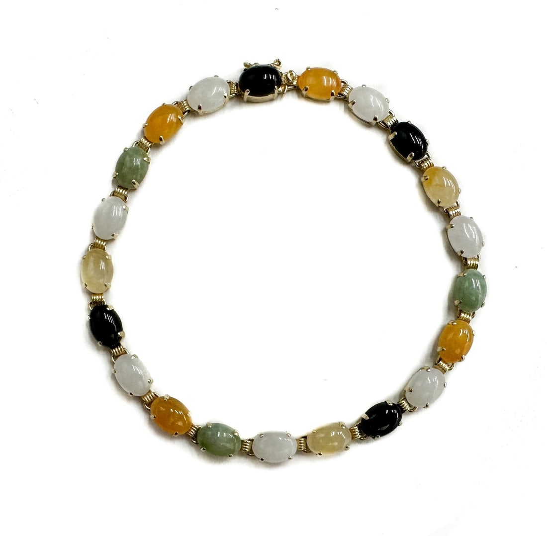 14k Yellow Gold Onyx and Multi-Colored Jade Cabochon Link Bracelet: 14k Yellow Gold Onyx and Multi-Colored Jade Cabochon Link Bracelet. Multicolored green, white, yellow, and red/orange jade with onyx to the bracelet. Each measures approximately 7.2mm x 5.1mm x 2mm. M