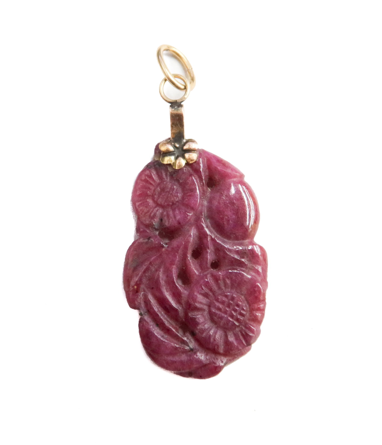 14k Yellow Gold and Carved Ruby Floral Pendant: 14k Yellow Gold and Carved Ruby Floral Pendant. Etched sunflowers and butterflies throughout. The gold elements tests for 14k. Weight Approx., 4.31 grams Measures Approx., 1.75 inches x 0.75 inches