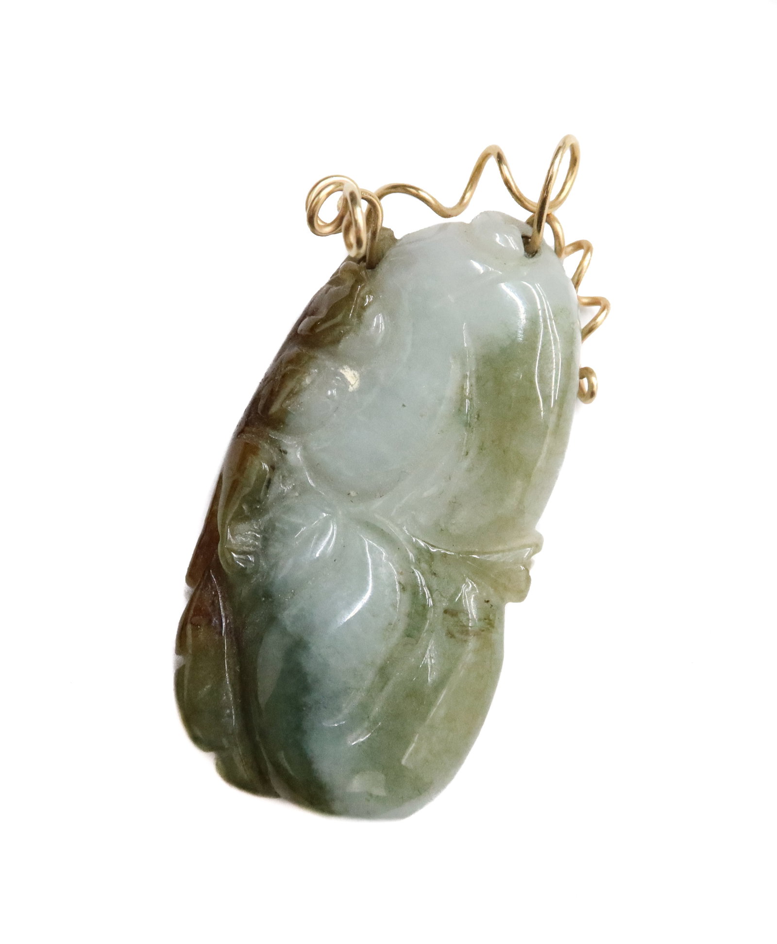 14k Yellow Gold and Green Jade Leaf Pendant: 14k Yellow Gold and Green Chinese Jade Leaf Pendant. Etched swirls throughout. A curled gold element to top testing for 14k gold. Weight Approx., 17.72 grams Measures Approx., 2 inches x 1 inch