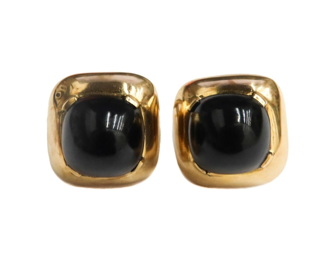 Gump's 14k Yellow Gold and Cabochon Black Jade Clip On Earrings: Gump's 14k yellow gold and cabochon black jade clip on earrings. The jade measuring approximately 13.1mm x 13.1mm x 8.5mm. Marked Gump's 18k to back. Weight: Approx. 18.23 grams Measurements: Approx. 