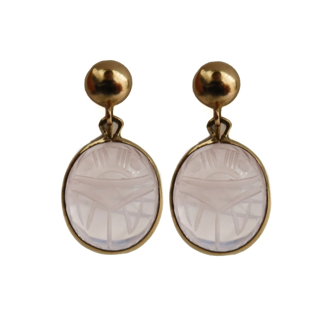 14k Yellow Gold Carved Rose Quartz Scarab Twist Back Earrings: 14k Yellow Gold Carved Rose Quartz Scarab Twist Back Earrings. Carved cabohon rose quartz in the form of a scarab measuring approximately 14.2mm x 12mm x 6.7mm. Marked 14k. Weight Approx., 5.52 grams 