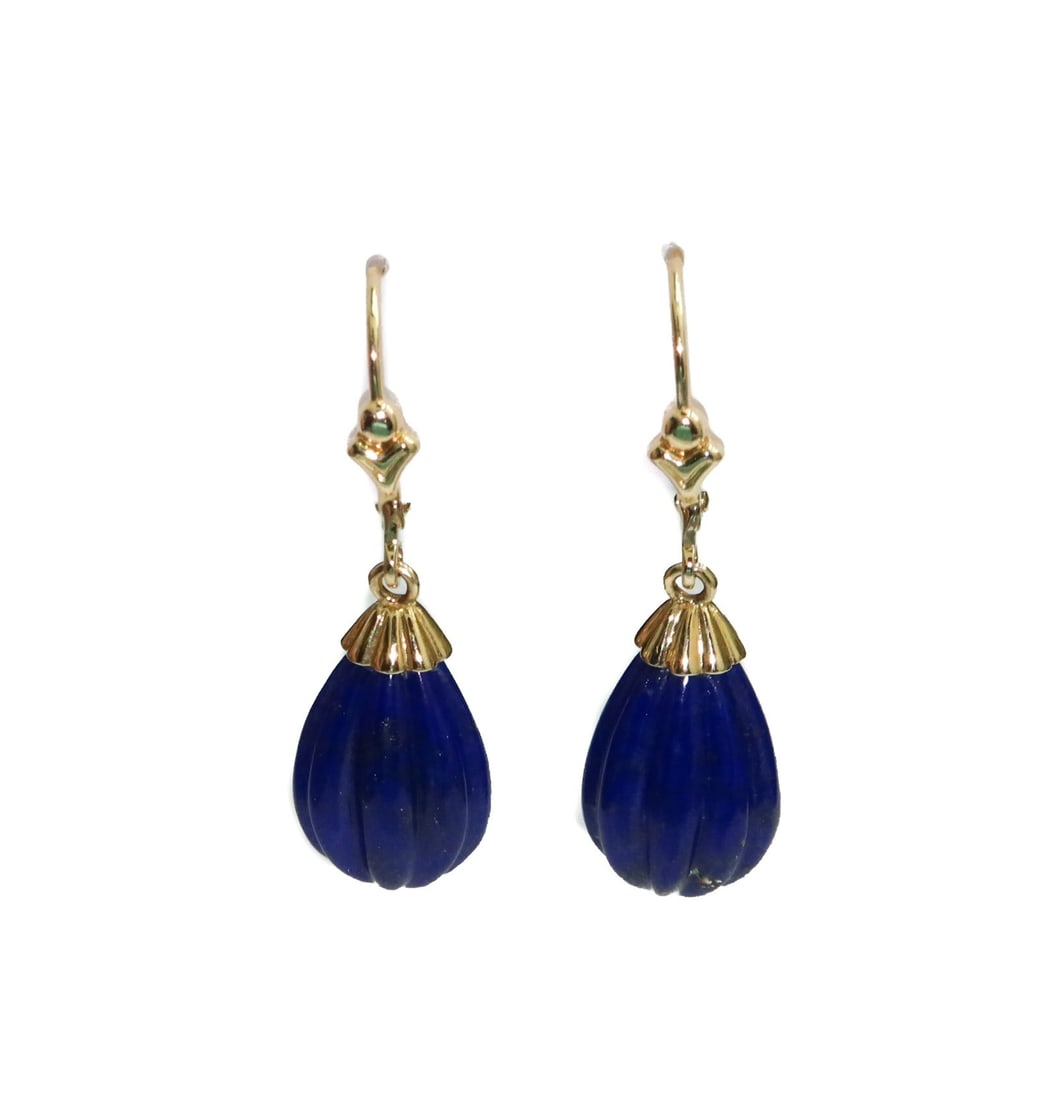 14k Yellow Lapis Lazuli Drop Earrings: 14k Yellow Lapis Lazuli Drop Earrings. Ribbed teardrop lapis measuring approximately 14.2mm x 9.03mm. Marked 14k with maker mark "EA" to hinge. Weight Approx., 1.25 inches length Domestic Shipping:$25