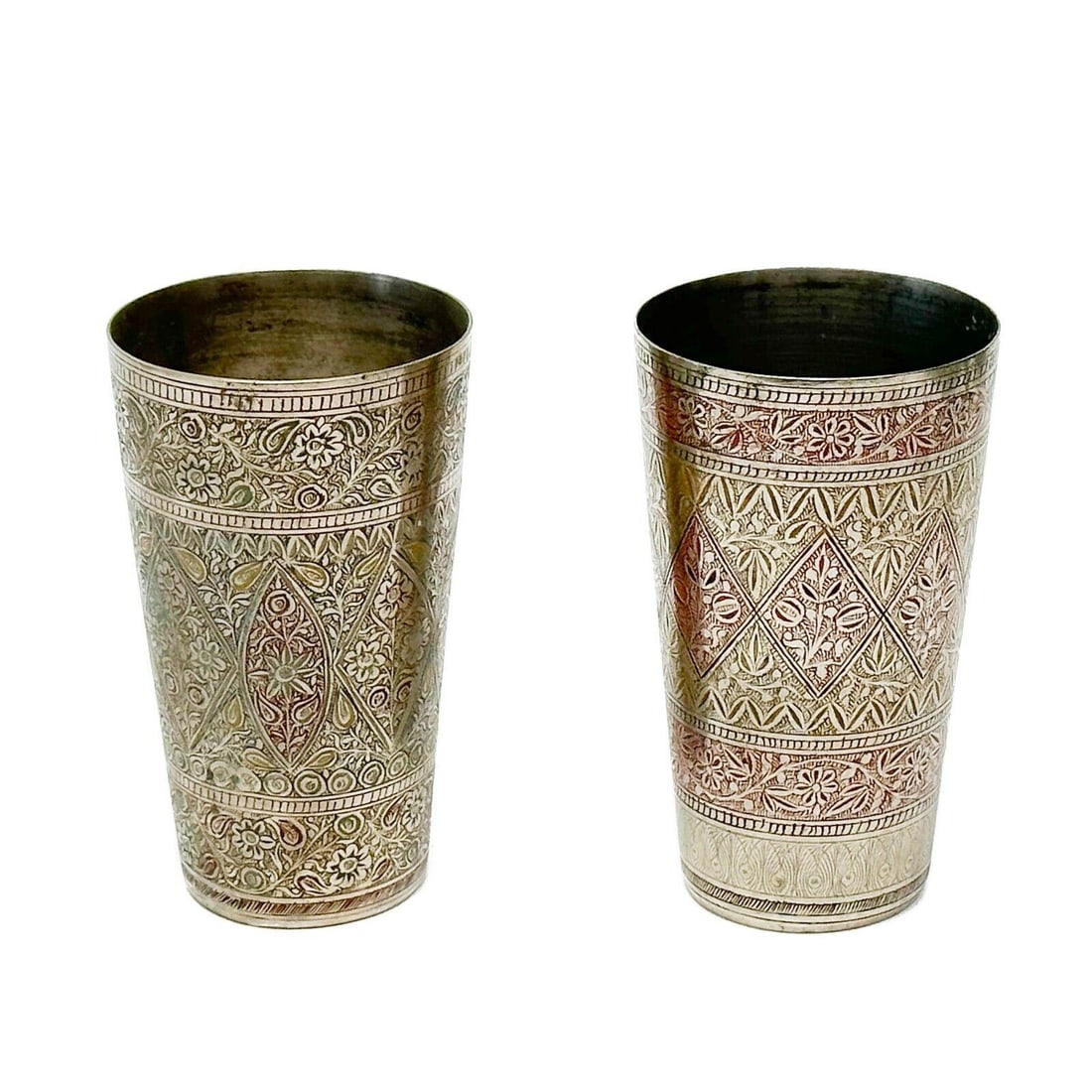 Pair Indo-Persian Enameled Silver Alloy Metal Beakers 1st half 20th century: Pair Indo-Persian Enameled Silver Alloy Metal Beakers, 1st half 20th century. Engraved geometric and floral patterns to the sides with yellow and red enameled decoration. They do not appear to be silv