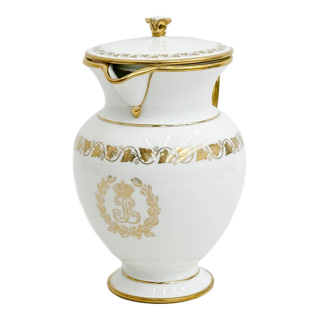 Manufacture de Sevres Chateau de Trianon Water Pitcher Pot a Decoction 1845: Manufacture de Sevres Chateau de Trianon Gilt Porcelain Water Pitcher Pot a Decoction, 1845. A white ground decorated with gilt ivy leaves to the edge, stylized monogram to the center beneath a crown 