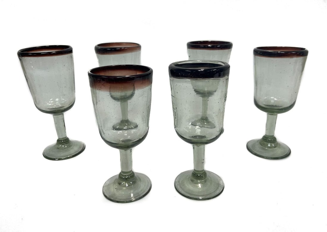 6 Italian Hand Blown Green and Amethyst Glass Wine Goblets, Mid Century: 6 Italian hand blown wine goblets, Mid Century. Faint blue/green to the body with amethyst to the rims. Rough pontils to the underside base. Weight Approx., 2 lbs Measures Approx., 2.6 inches diameter
