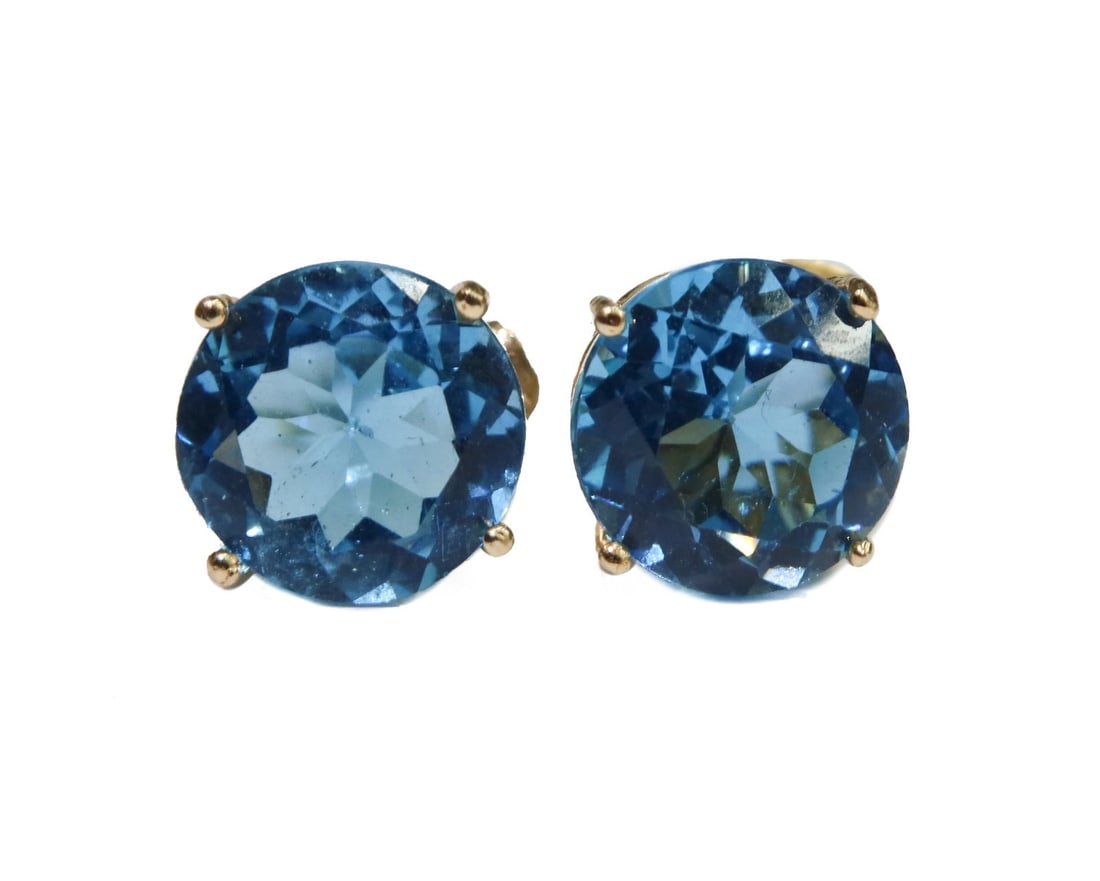 14k Yellow Gold and Topaz Jewel Earrings: 14k Yellow Gold and Topaz Jewel Earrings. Round cut Topaz Jewels measuring approximately 10.03mm x 6.39mm and weighing approximately 8.22 carats total. Marked 14k. Weight Approx., 3.64 grams Measures 