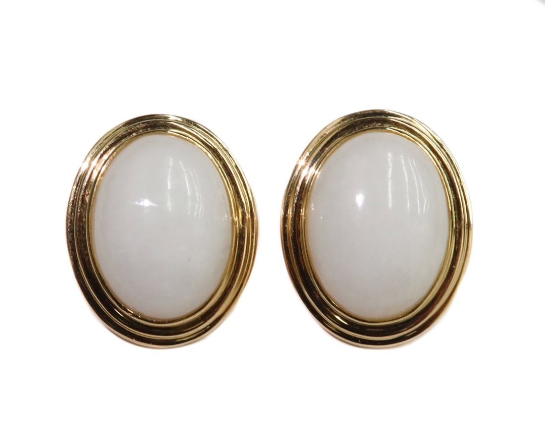Gump's 14k Yellow Gold and Cabochon White Jade Clip Earrings: Gump's 14k Yellow Gold and Cabochon White Jade Clip Earrings. Cabochon jewels measuring approximately 15.89mm x 12.03mm x 5.84mm. Marked Gump's 14k to backing Weight Approx., 10grams Measures Approx.,