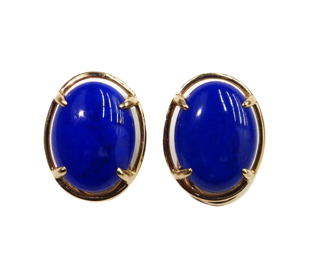 Gump's 14k Yellow Gold and Cabochon Lapis Lazuli Clip Earrings: Gump's 14k Yellow Gold and Cabochon Lapis Lazuli Clip Earrings. Cabcochon lapis lazuli measuring approximately 16.15mm x 12.03mm x 5mm. Marked Gumps 14k. Weight Appox., 7.9 grams Measures Approx., 0.7