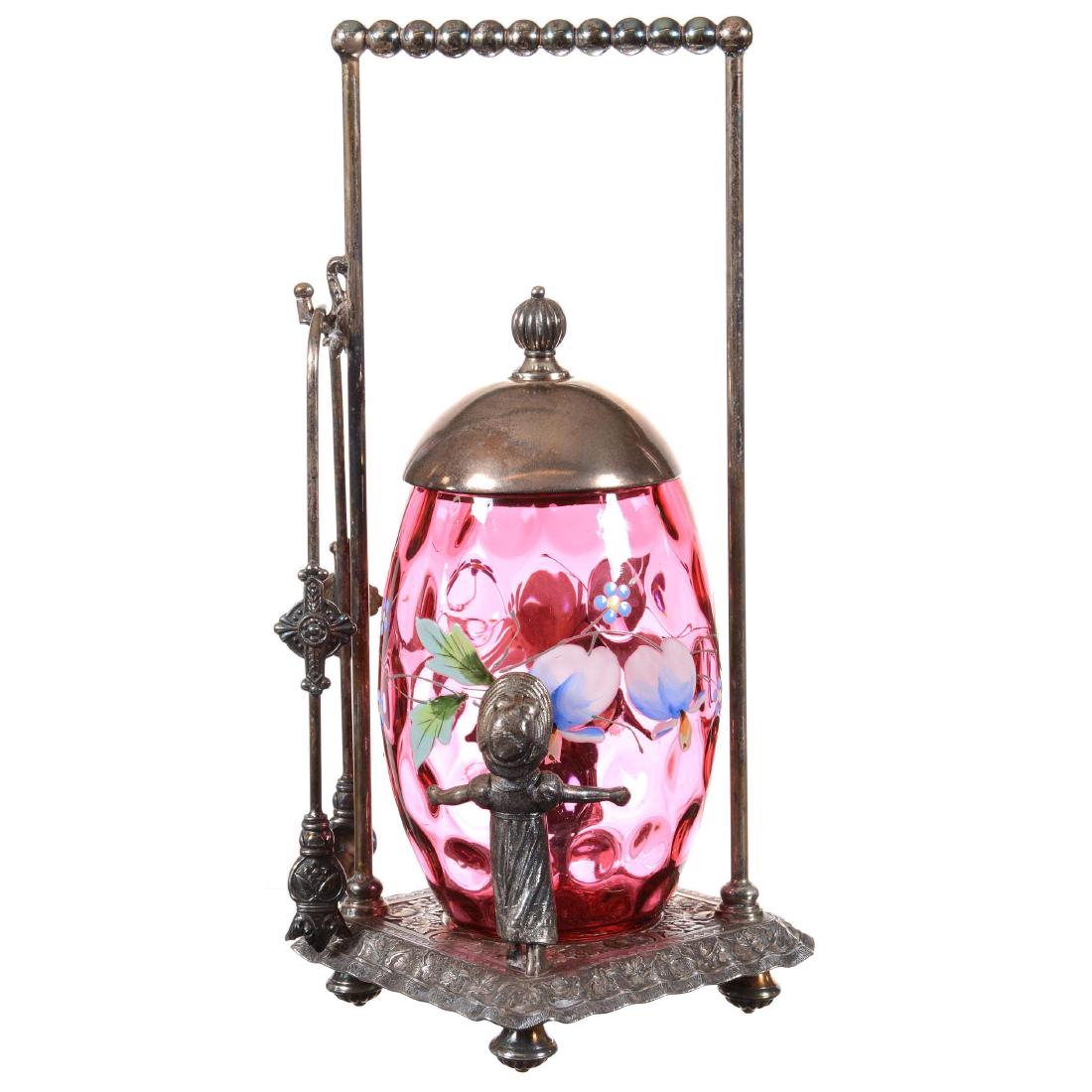 Pickle Castor: 9.75" Pickle Castor - Cranberry Art Glass Egg Shaped Insert with Enamel Daisy Dï¿½cor - Set on Tufts #3397 Silverplate Kate Greenaway Frame