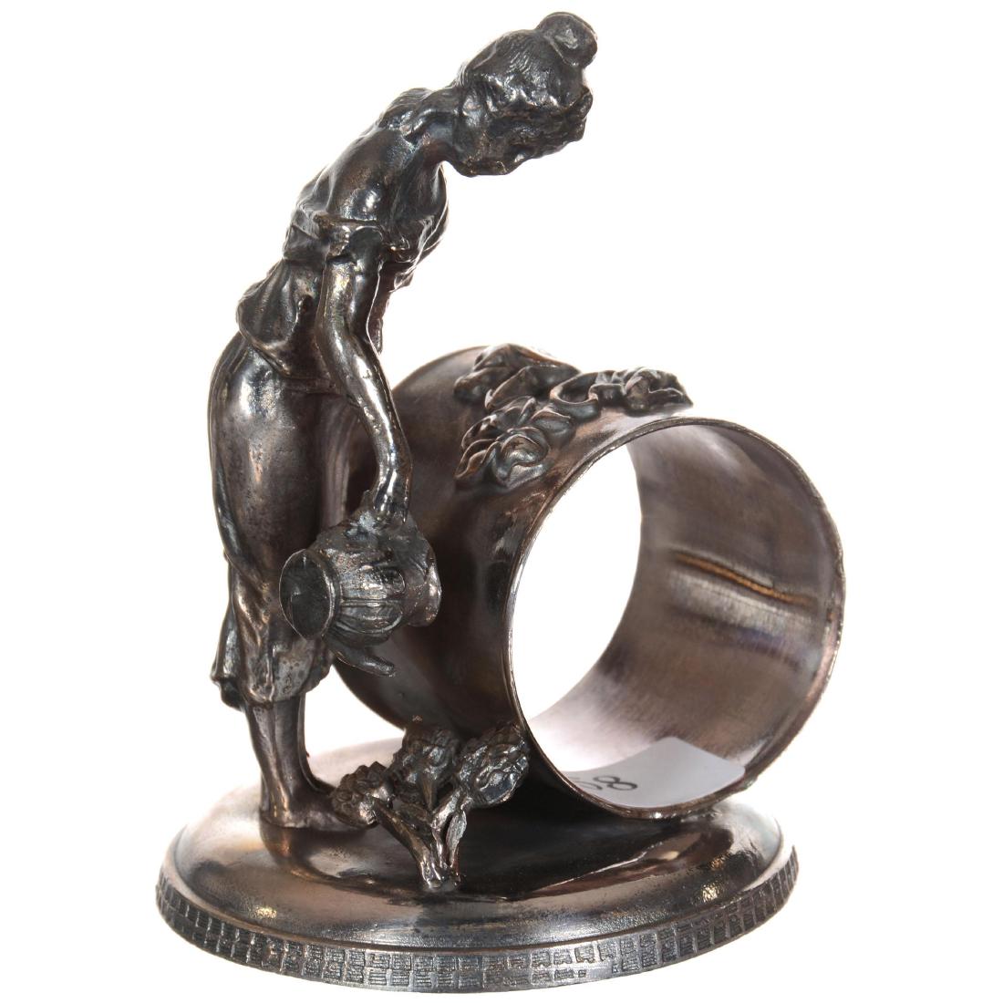Aurora (No # Visible) Napkin Ring: 3.75" X 2.75" Aurora (No # Visible) Napkin Ring Woman Watering Flowers