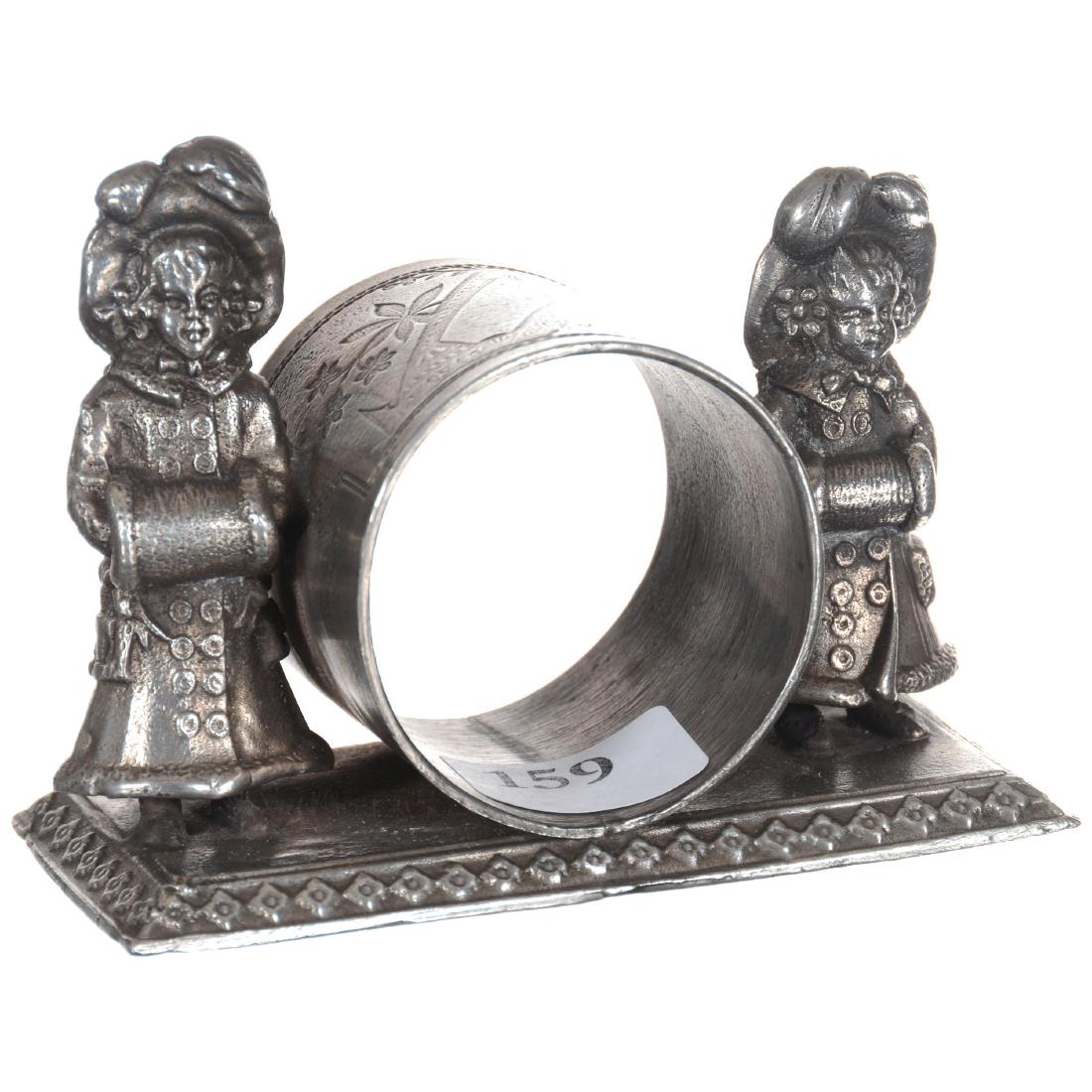 Silver-plate Napkin Ring: 2.5" X 3.5" Silver-plate Napkin Ring Strickland, No Number - Two Kate Greenaway Children in Winter Clothing