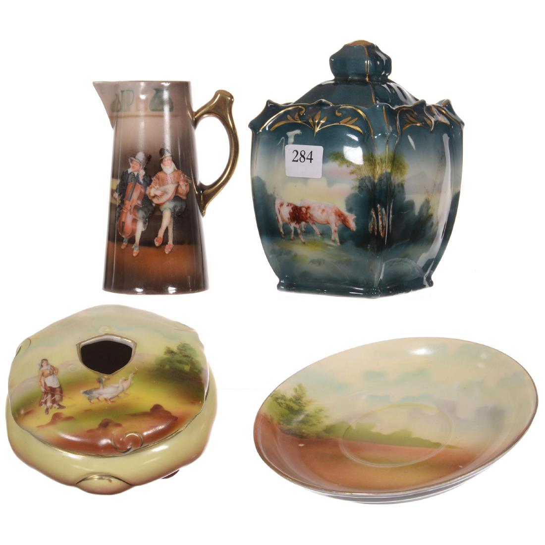 Five Assorted Royal Bayreuth Items Including: (5) Assorted Royal Bayreuth Items Including (1) 5" Square Sugar Bowl with Cow Scenic Decor - (1) 4.25" Pitcher with Musicians Scenic Decor - (1) 4" Hair Receiver with Woman and Geese - (1) Sugar Bowl