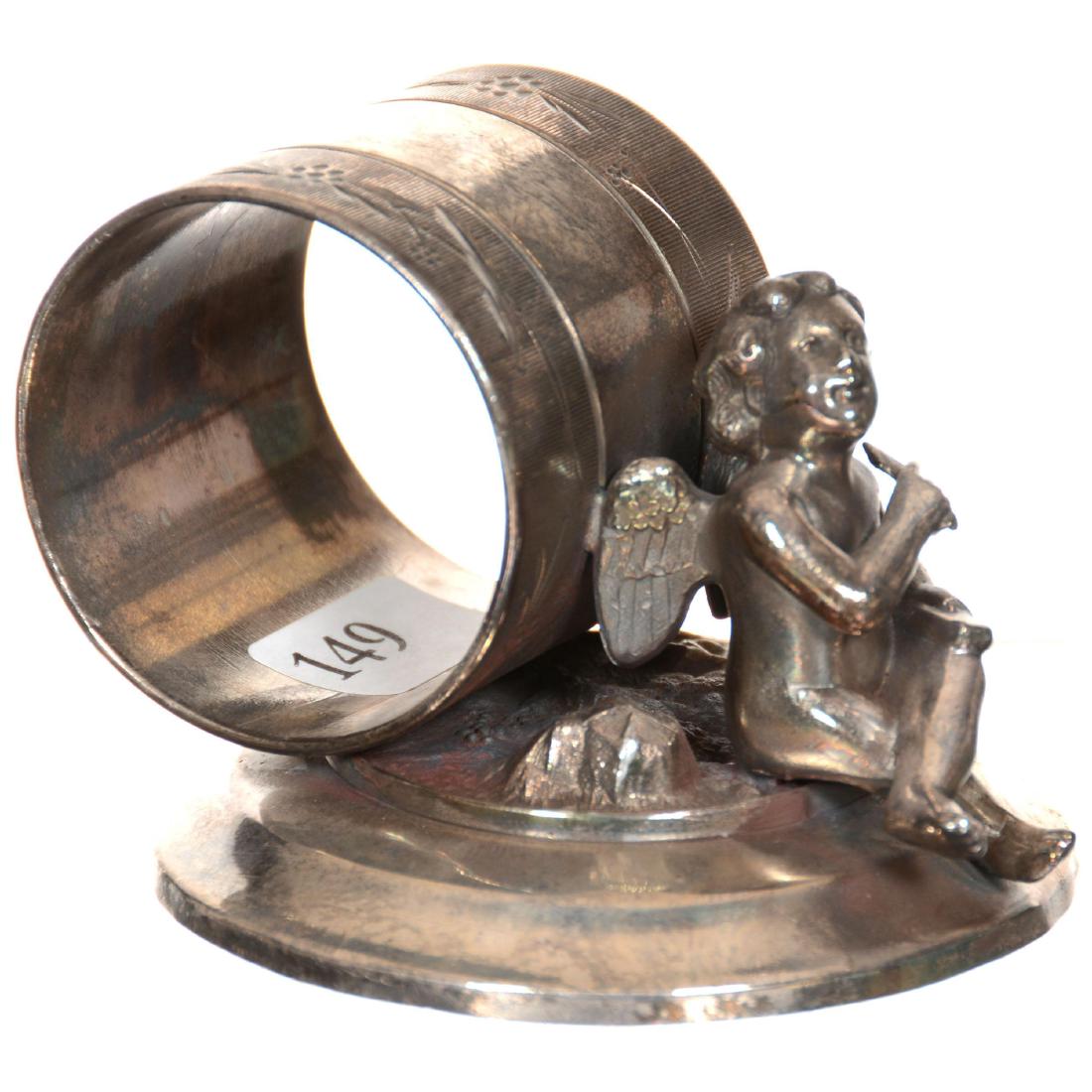 Victorian Silverplate Napkin Ring: Victorian Silverplate Napkin Ring 2.25" X 3" - Meriden #219 - Cherub Sharpening Arrow