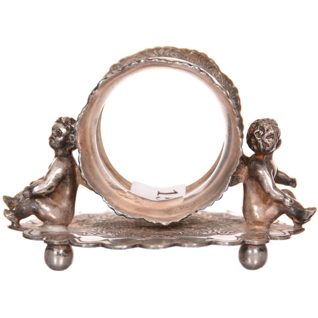 Victorian Silverplate Napkin Ring: Victorian Silverplate Napkin Ring 2.25" X 3.5" - Wilcox #0156 - Two Winged Cherubs Holding Ring