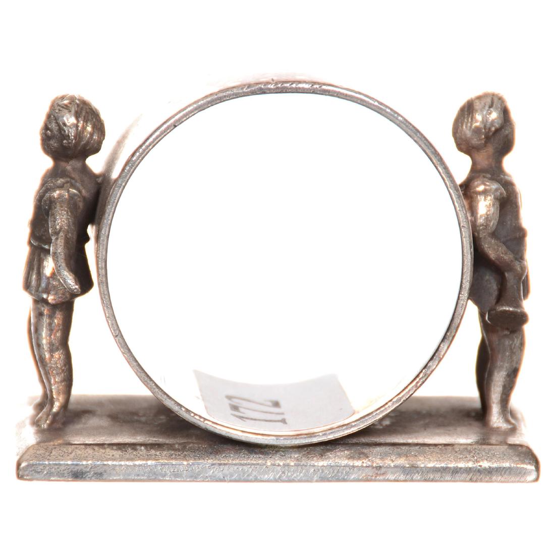 Victorian Silverplate Napkin Ring: Victorian Silverplate Napkin Ring 1.75" X 2.25" - No Maker's Mark Visible - Model #340 - Two Heralds with Trumpets on Each Side of Ring