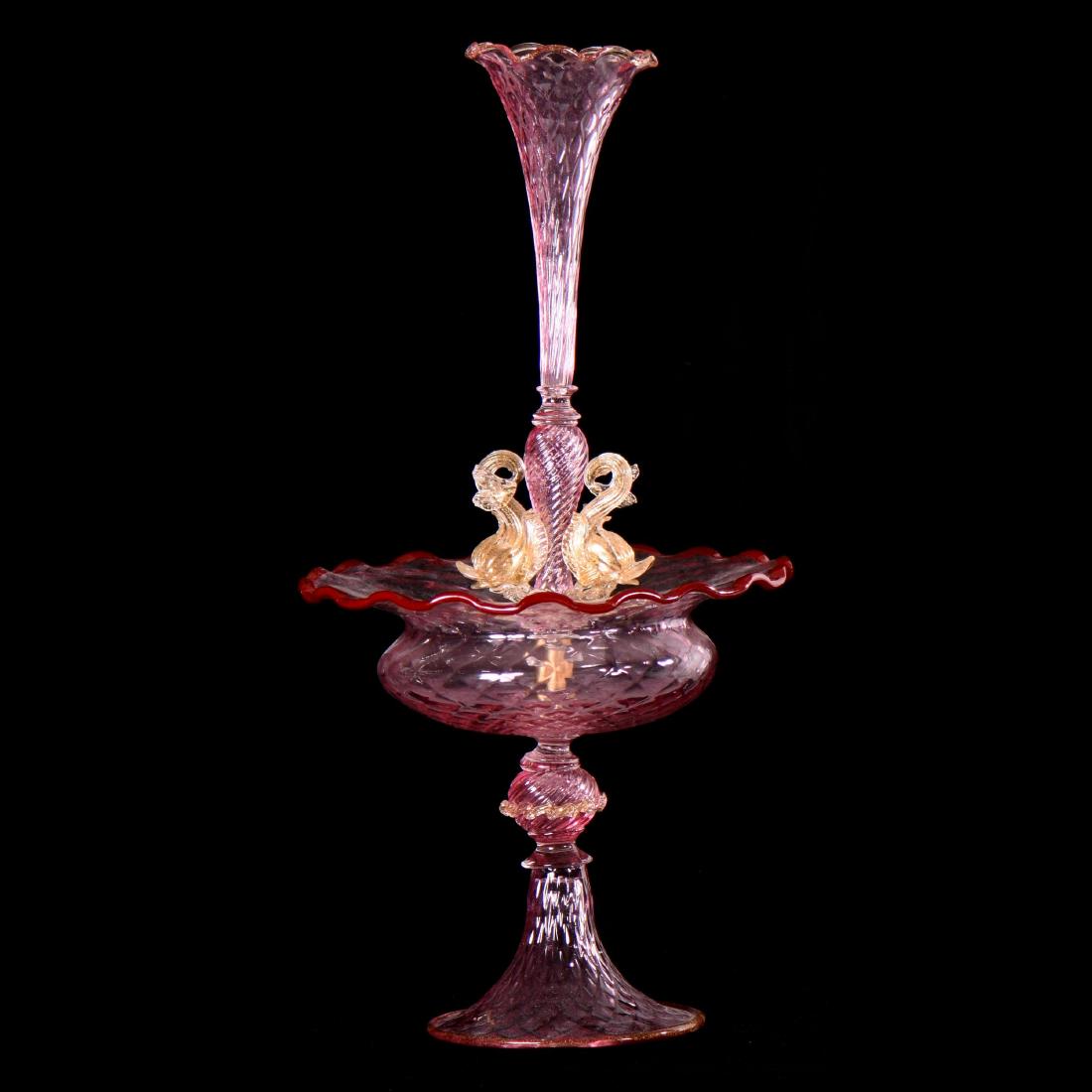 Venetian Art Glass Pedestal Epergne - 23.5" X 12": Venetian Art Glass Pedestal Epergne - 23.5" X 12" Pink Cut Velvet Body with Painted Maroon Rim - Removable Center Lily with Figural Dolphin Highlights - Some Paint on Rim Is Flaking