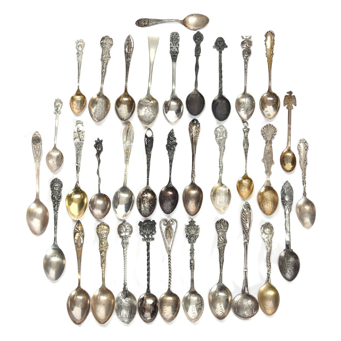 (33) Sterling Demitasse Souvenir Spoons: (33) Sterling Demitasse Souvenir Spoons - Various Designs Including - Cuba, Indian, Texas, Floral, Peru, (2) Unmarked Spoons and More - See Photos for Details - 325 Grams Total Weight