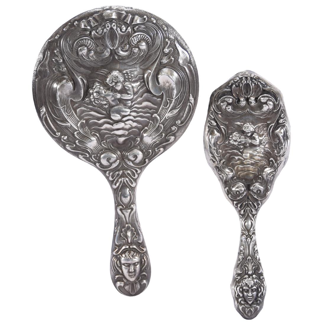 Two Piece Sterling Silver Vanity Set: Two-Piece Sterling Silver Vanity Set - 11" Hand Mirror with Beveled Mirror - 9" Hairbrush - Matching Art Nouveau Decor - Maker's Mark Appears to Be "HB" - Quality Set