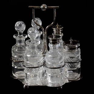 English Condiment Set 8.5" X 7.5": English Condiment Set - 8.5" X 7.5" - (6) Cut Glass Bottles with Silverplate Tops and Glass Stoppers Set on Hallmarked Silverplate Frame - Top Rim Polished on One Bottle