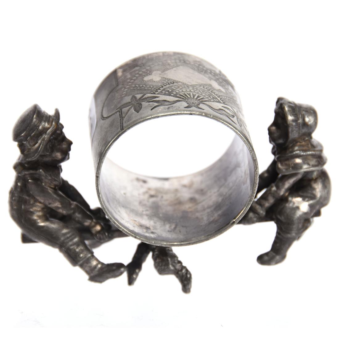 Figural Silverplate Napkin Ring 2.5" X 4": Figural Silverplate Napkin Ring - 2.5" X 4" - Boy and Girl on Seesaw - Missing Silverplate Base - Same Ring as Lot #311, Except for Missing Base