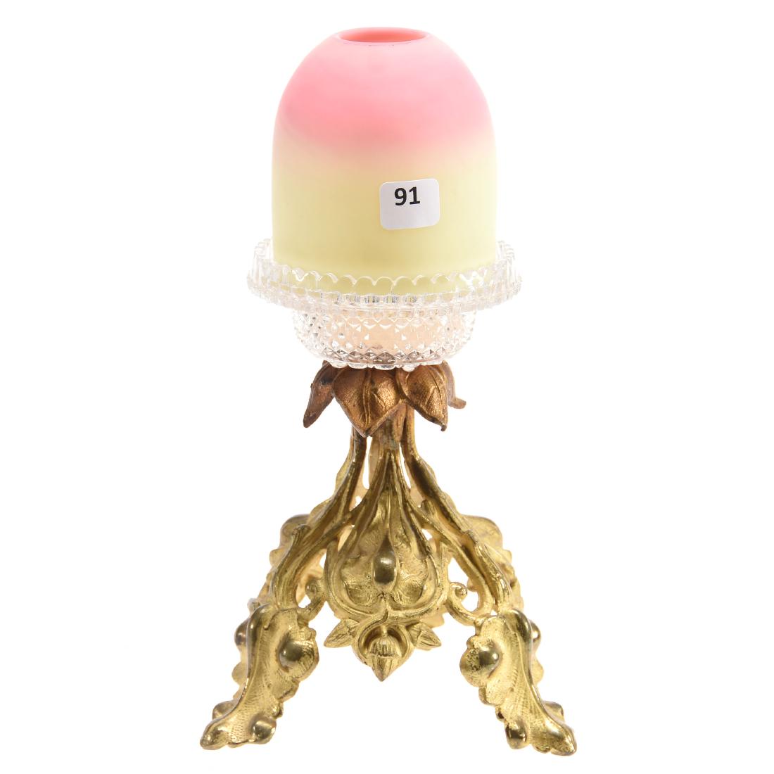 Victorian Burmese Art Glass Fairy Lamp 10.5": Victorian Burmese Art Glass Fairy Lamp - 10.5" - Burmese Art Glass Shade Set on Clear Clarke Base Which Is Mounted on a Three Footed Brass Stand