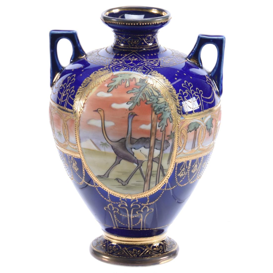 Marked Nippon Two Handle Vase 7.75" X 5.5": Marked Nippon Two Handled Vase - 7.75" X 5.5" - Cobalt Blue Background with Medallion Egyptian Scene on One Side and Ostrich Scene on Other