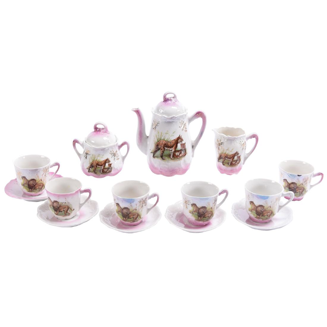 Childs Fourteen Piece Tea Set Unmarked Germany: Childs Fourteen Piece Tea Set - Unmarked Germany - Pink and White Lustre Finish with Rare Tigers & Lions Scenic Decor - 6" Teapot, Creamer, Sugar with Lid, (6) Cups, (5) Saucers (One of Which Is A Mis